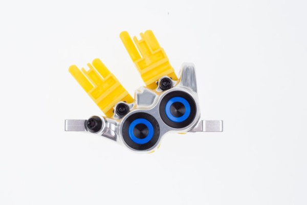 Magura Bremssattel MT Trail Carbon VR 4-Kolben chrom, Blende blau, inkl. Belge, 1 Stk.